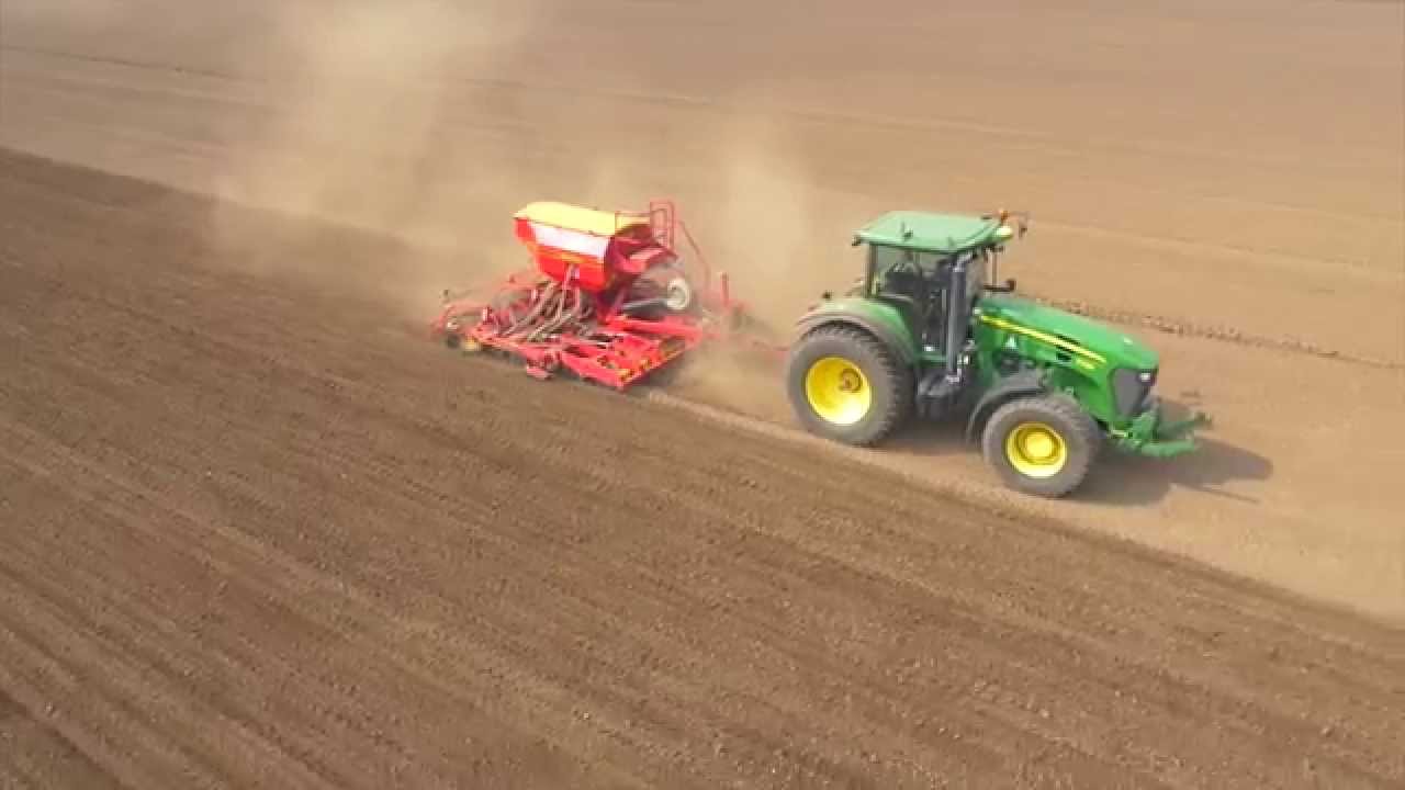 Pode Hole farm drilling peas with John Deere 7730 and Vaderstad drill