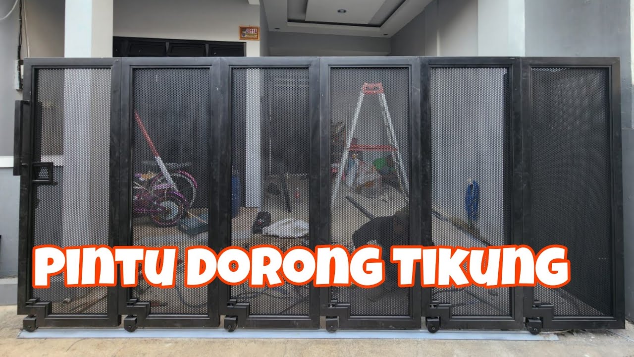 Pintu  Dorong Tikung - Solusi pintu dorong pada lahan sempit.