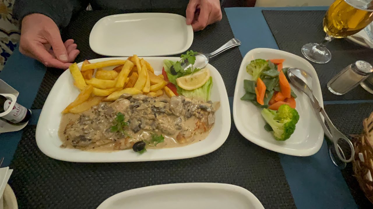 🇵🇹 Madeira Funchal. its raining and we are hungry , nearest restaurant to us it the Trigel