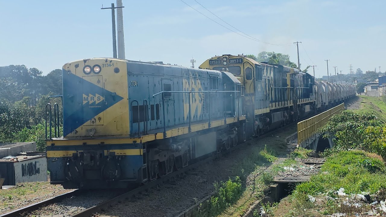 Trem carregado partindo da Alça de Manoel Feio liderado por uma U20C 3134-1 - Ramal SP
