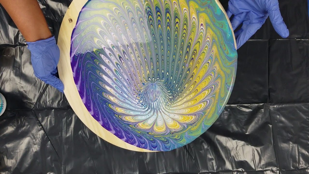 (39) Sink strainer pour on 18in round wood table top, finished with resin