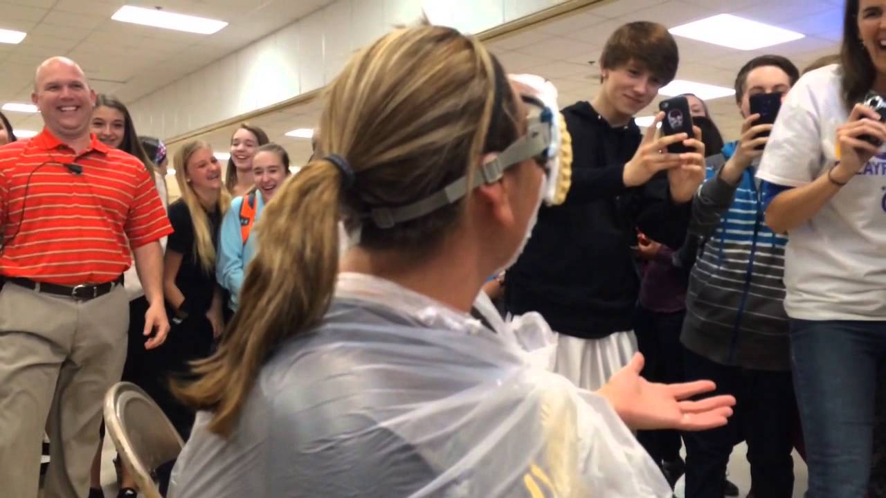 Bay City Western High School principals take pie to the face for Relay for Life fundraiser