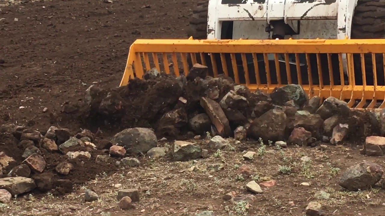 Skid steer rock bucket, sieve bucket, rock raking paddocks