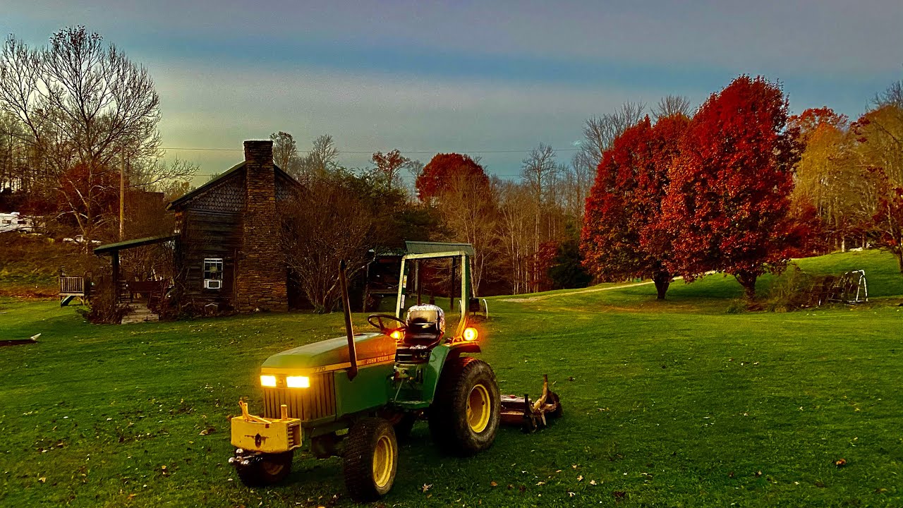 John Deere 770 compact tractor mowing with king kutter finish mower!