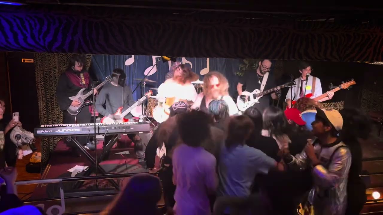 Mystery guitarist with the staff band is revealed