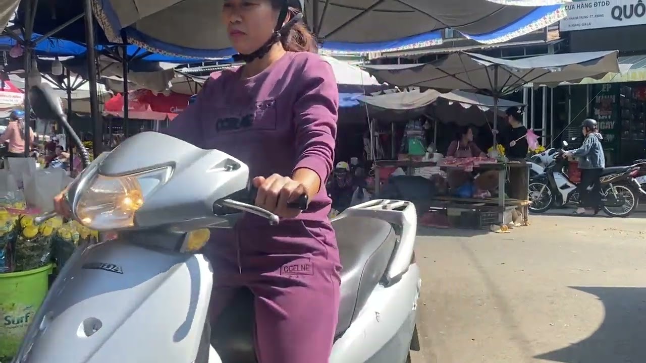 A bustling countryside market selling vegetables, meat, and fish #market