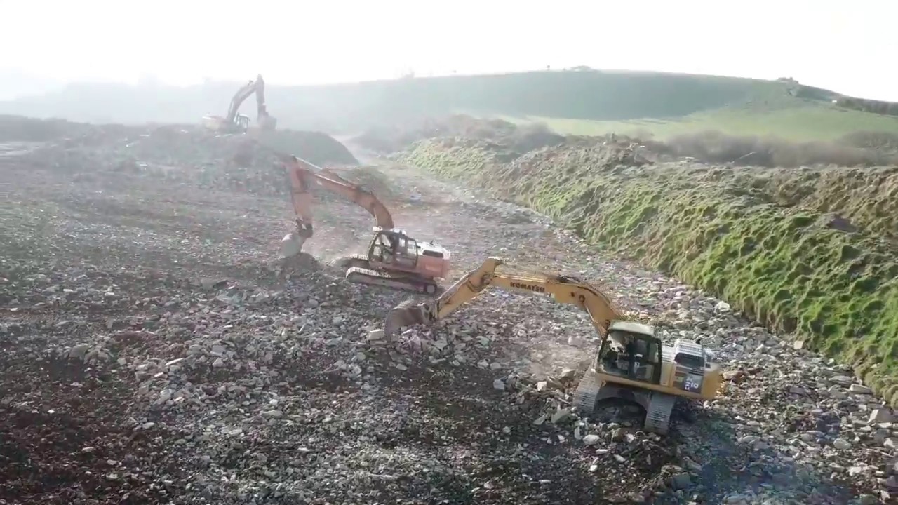 Volvo case komatsu hard at work