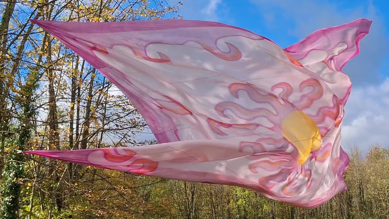 Silk flutters noisily in strong gusts of wind