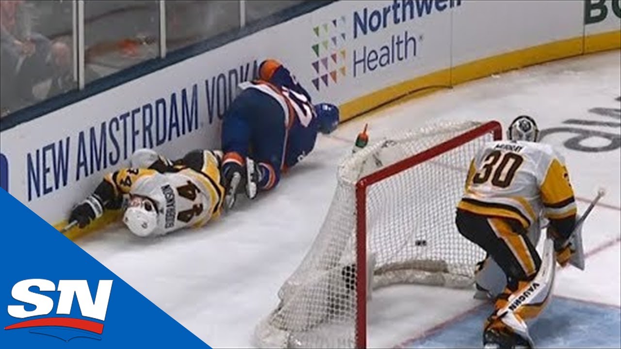 Erik Gudbranson Smashes Into End Boards After Colliding With Anders Lee