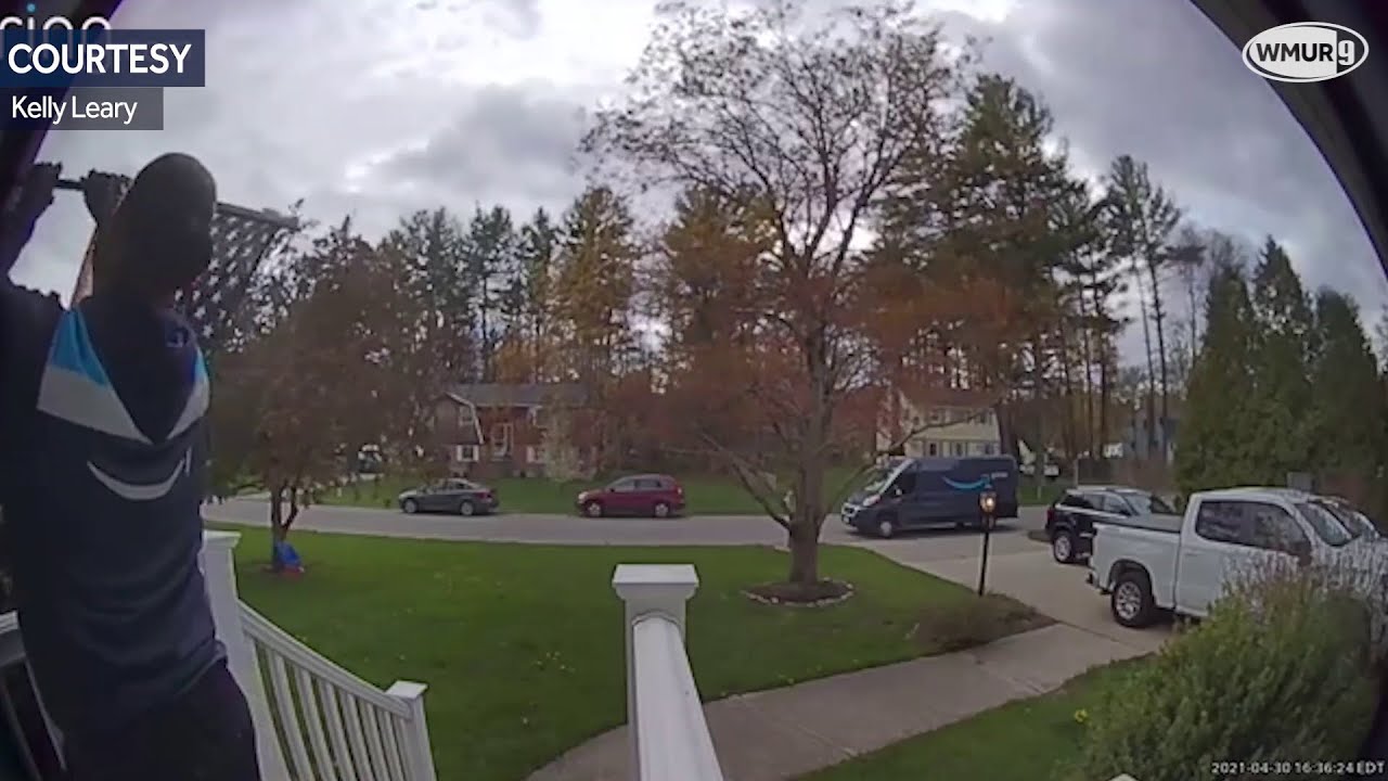 VIDEO: Amazon driver pauses to put American flag back on display at Merrimack home
