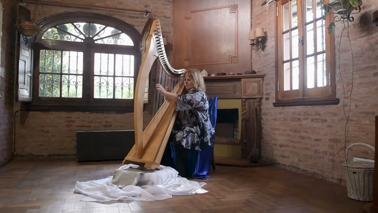 Chanter    Aida Delfino   Arpista