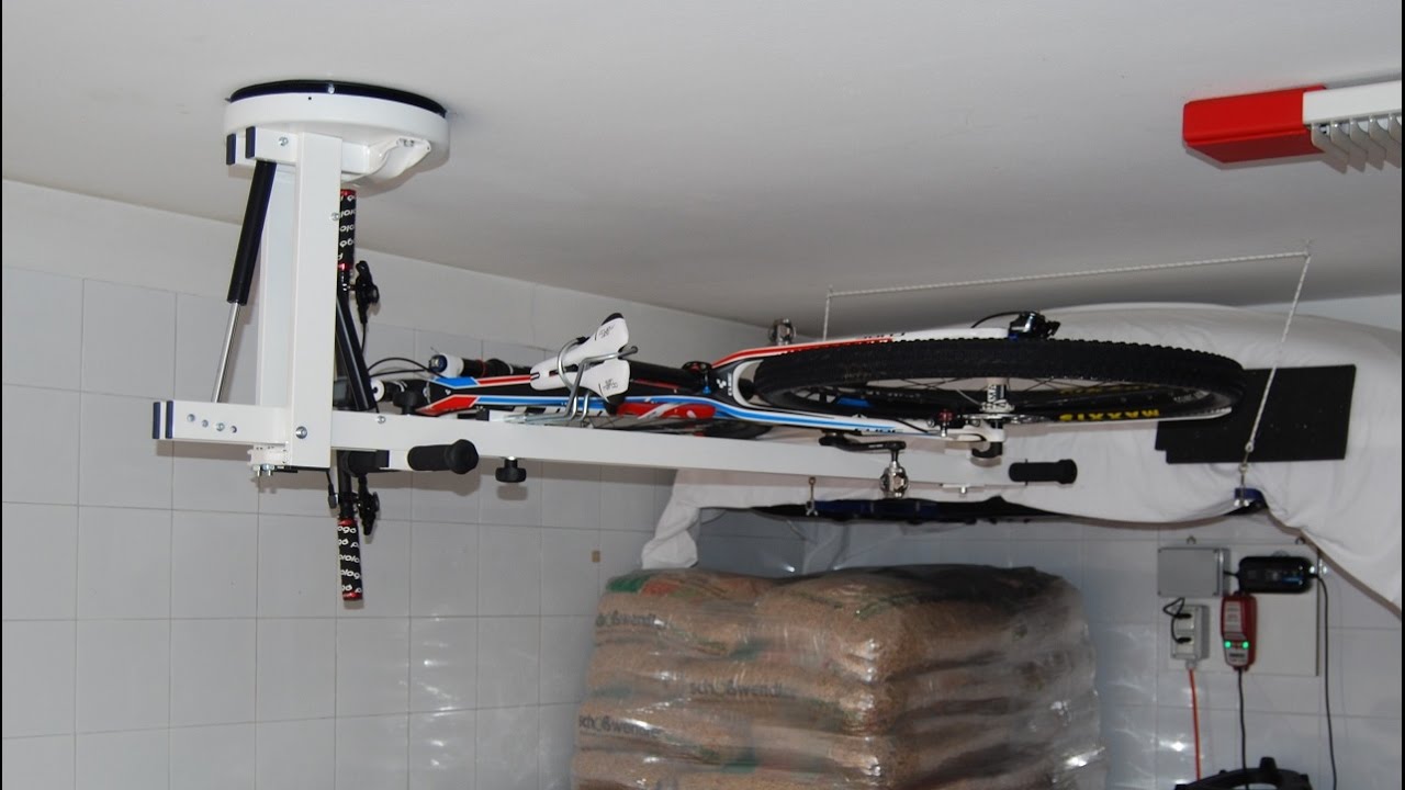 flat-bike-lift : the Ceiling Hydro-Pneumatic Bike Rack. Ball-Bearing Rotation Flange.