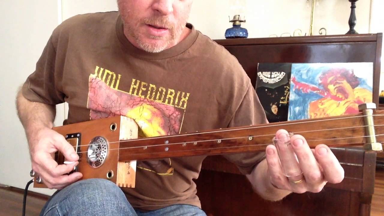 How to play Voodoo Chile (Slight return) on a 3 string slide cigar box guitar by Nigel McTrustry