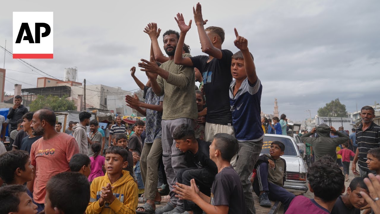 Palestinians celebrate in Gaza after Israel and Hamas agree to pause fighting