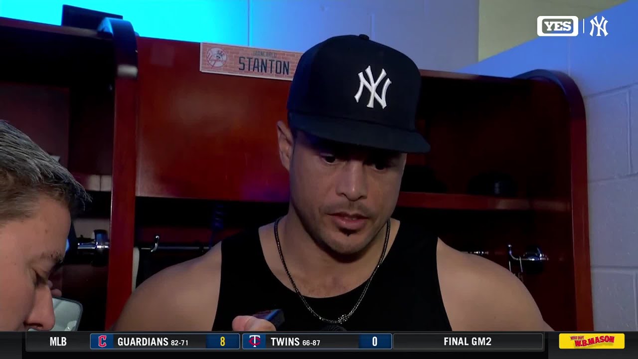 Giancarlo Stanton talks to the media about his 450th homer