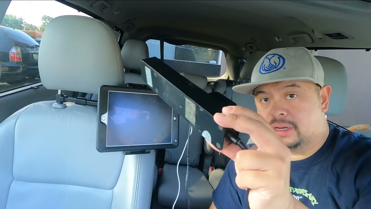 How to add a karaoke system with two wireless microphones in your car.