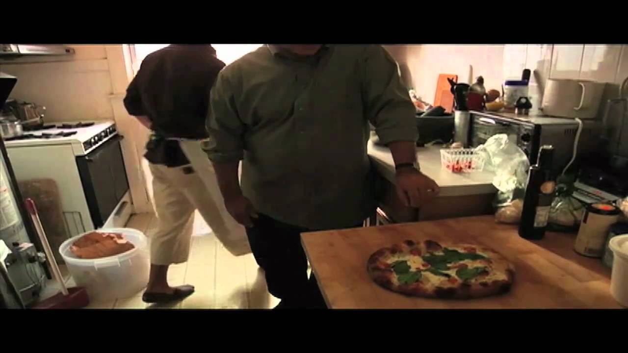 Above Tartine Bakery a Pizza is Made