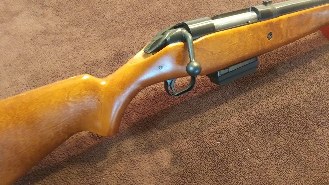 Bolt Action Shotgun: Mossberg 395 KB.