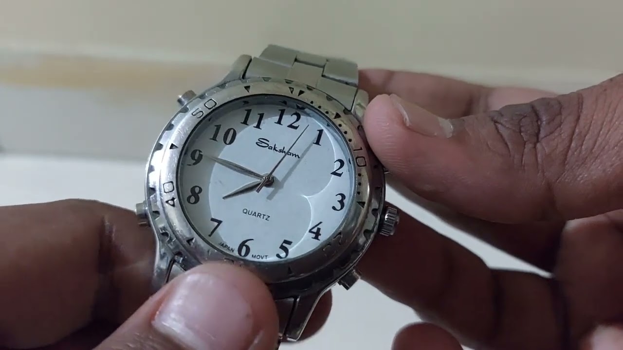 full overview of Talking silver wrist watch with metal strap from Saksham