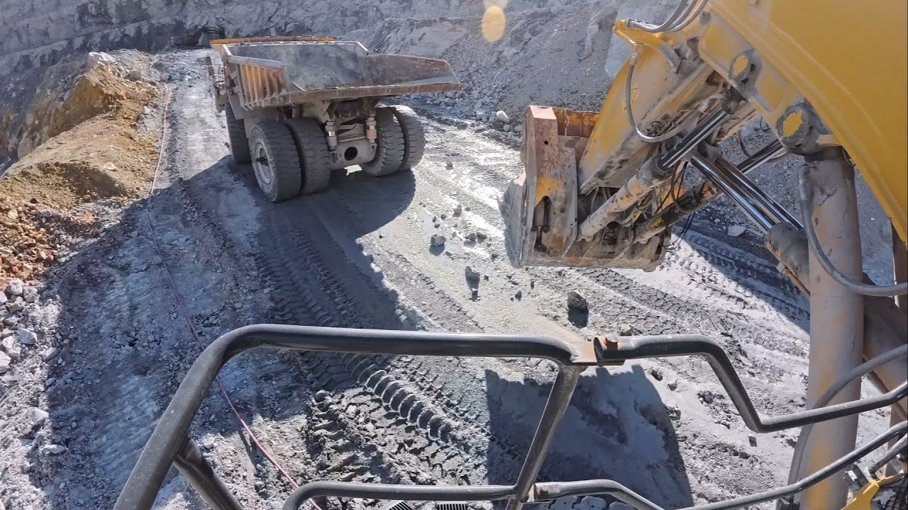 Cabin View of Komatsu PC4000 MASSIVE Excavator Crushes Through Ancient Rock Formation