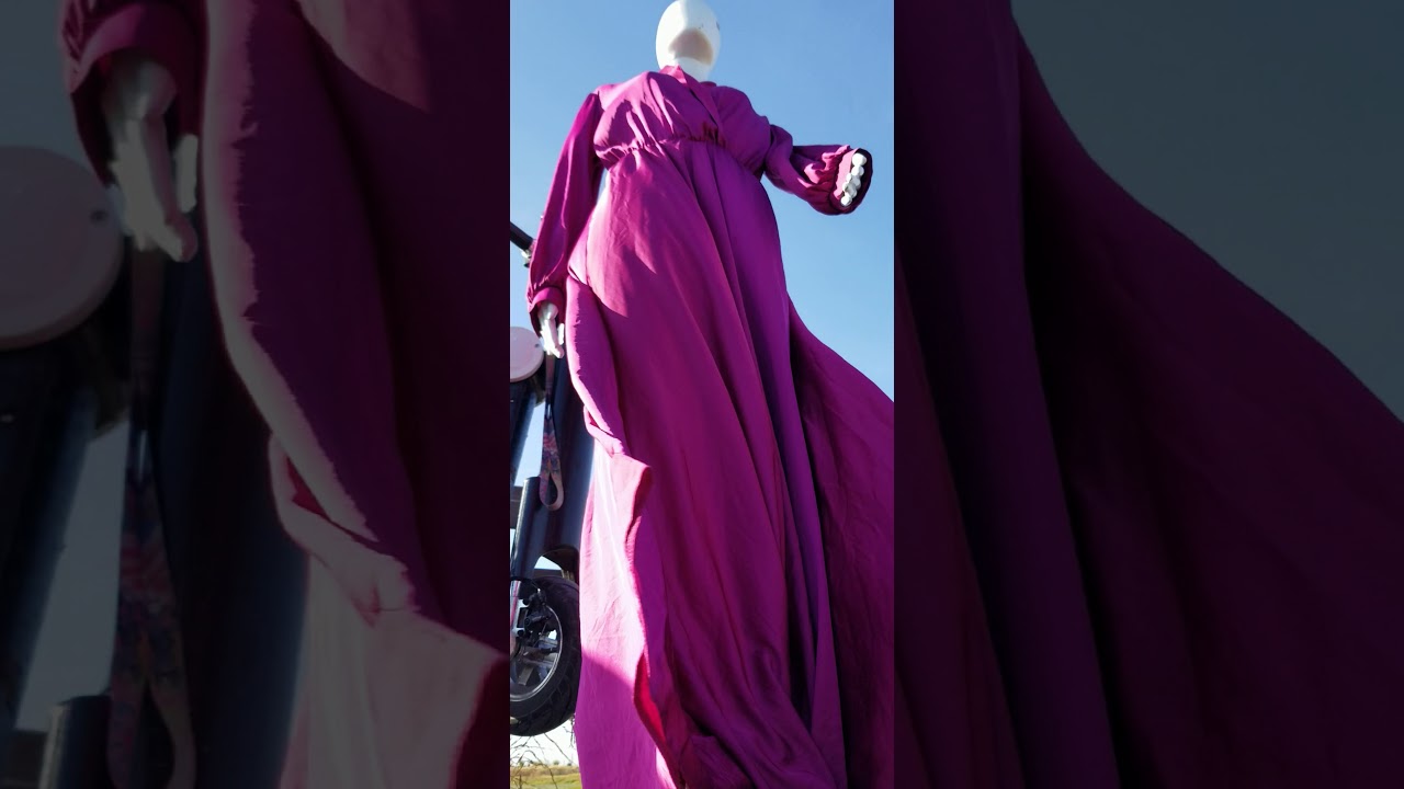 Dark Pink DREss with Mannequin in the wind