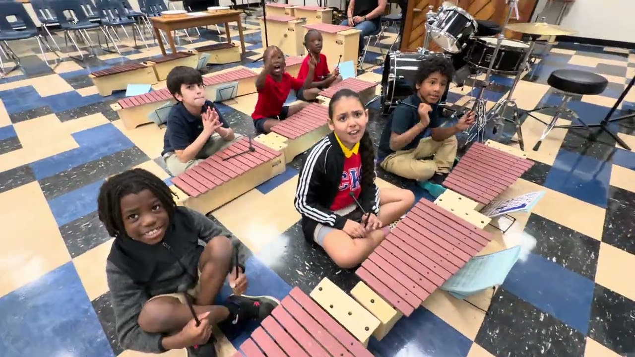 Achieve Music Students at Caribbean K-8 rehearsing on the Orfs