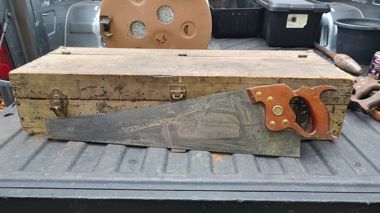 Old Carpenter hand saw tool box