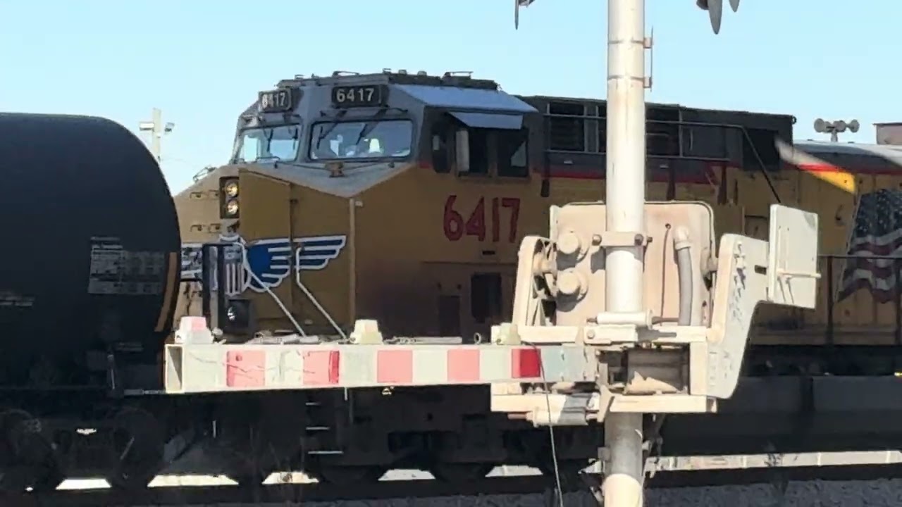 Union Pacific 6417 Goes Backwards Leading Long Mixed Train.