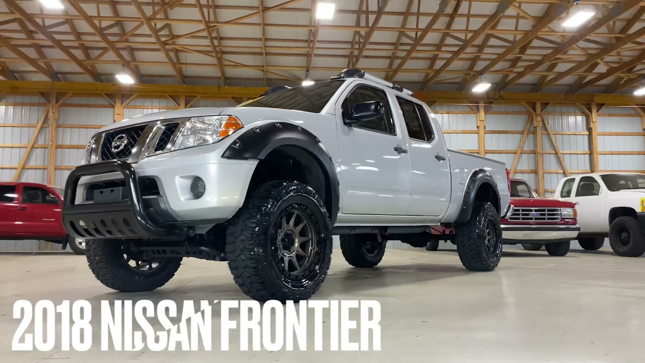 2018 Nissan Frontier with a NEW 6” lift, 35” tires, and 18” wheels!