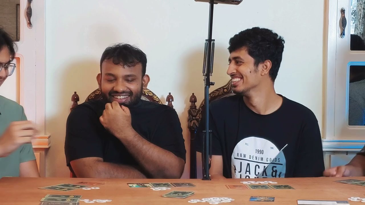 Playing Bengali Board Game (ষড়যন্ত্র ) with friends and family