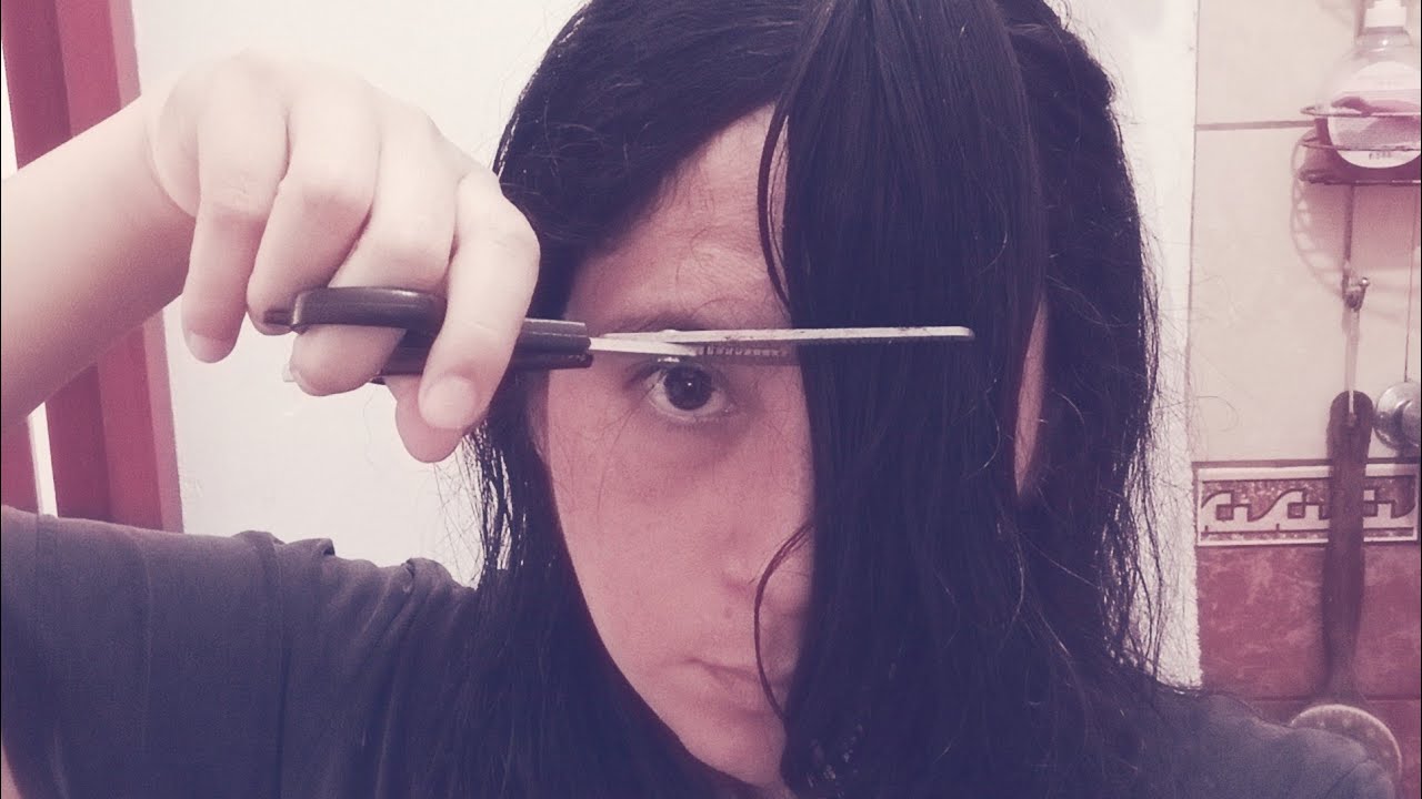 cortándome el cabello... eso intento....