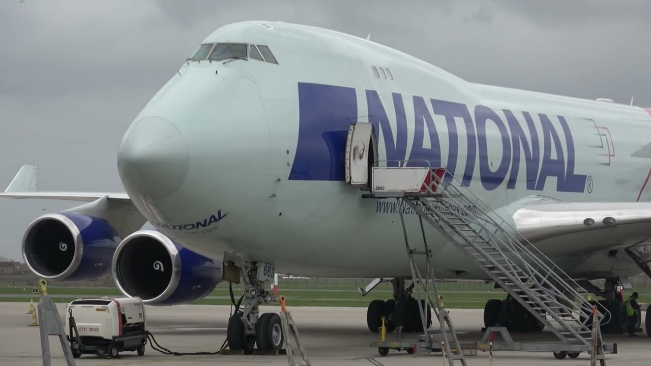 NATIONAL  Boeing 744  N663CA , arrival , special freight , take off in rain , EBOS