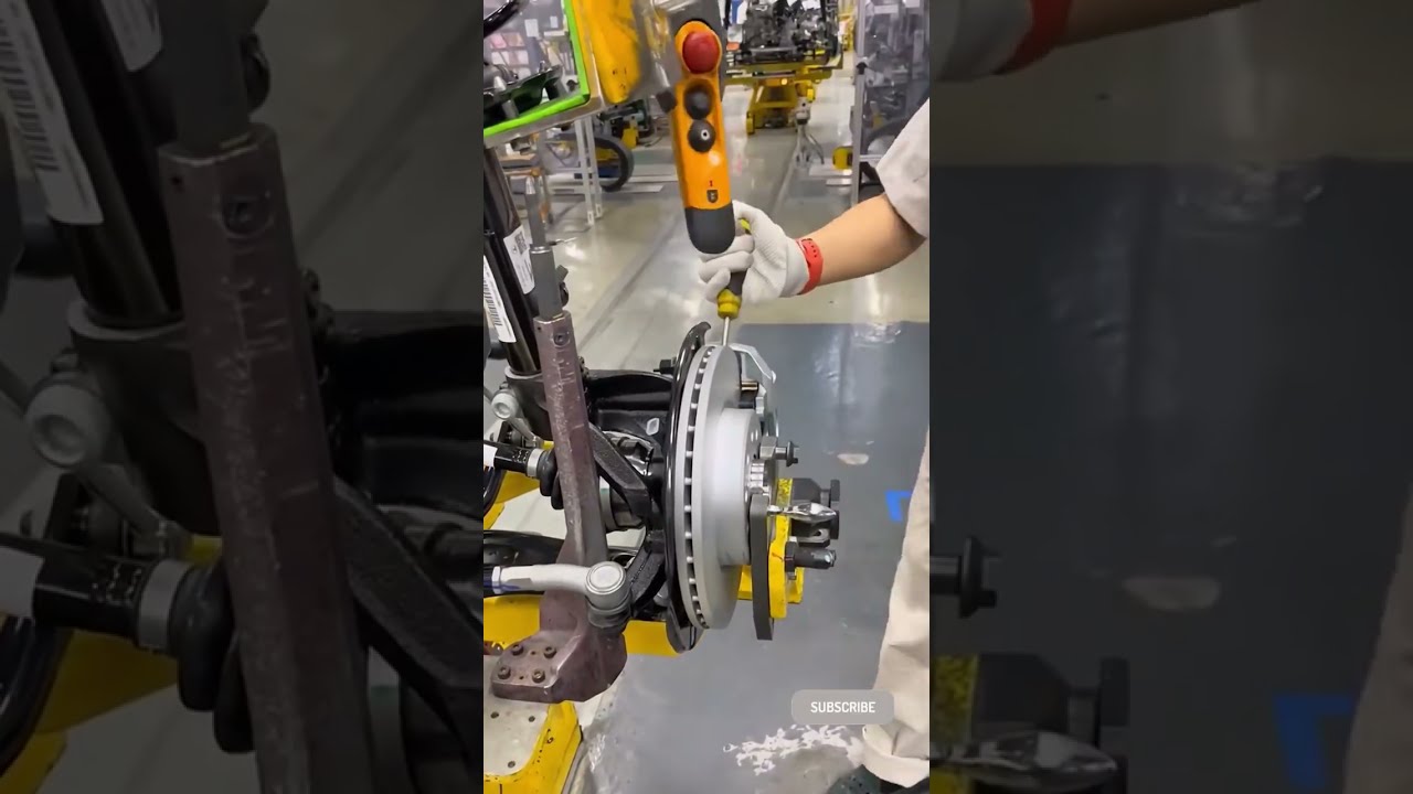 Precision Engineering: Car Suspension Assembly Line #automotive #robotics #factory