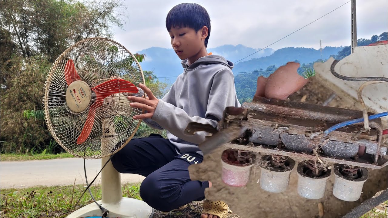 Genius boy repairs electric fan orphansDuynhan