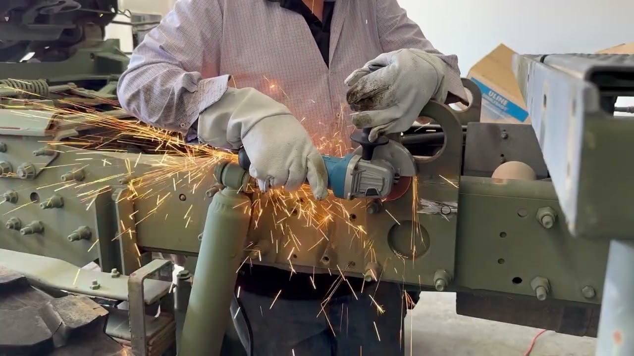 Cutting Huckbolts on an LMTV