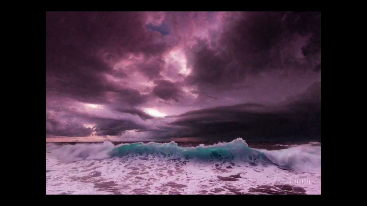 Pink sky and blue waves