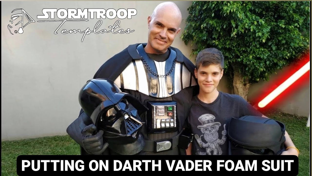 Putting on Darth Vader foam suit