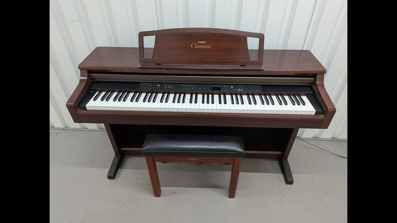 Yamaha Clavinova CLP-860 Digital Piano and stool in mahogany stock # 26106