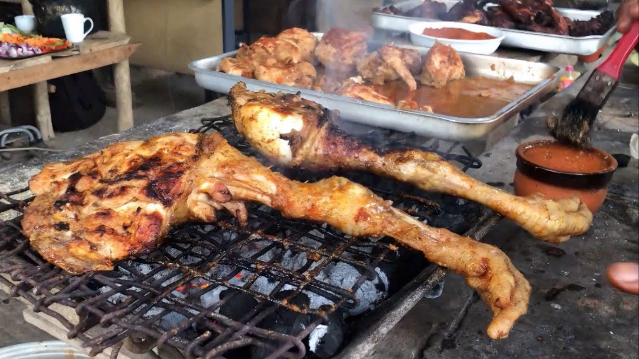 Village Life: Prepping Farm-Raised Chicken And Ghana Oil Rice And Charcoal Grilled Chicken.
