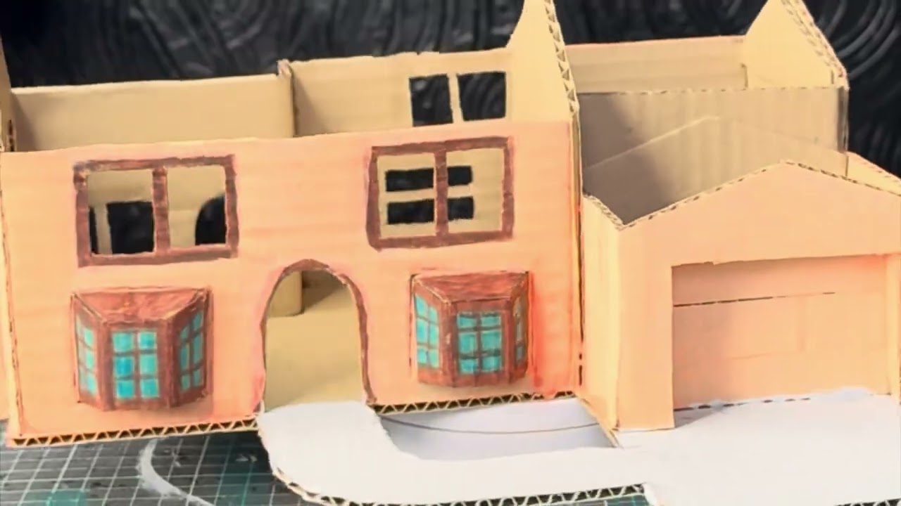 Artesão cria a casa dos Simpsons de papelão