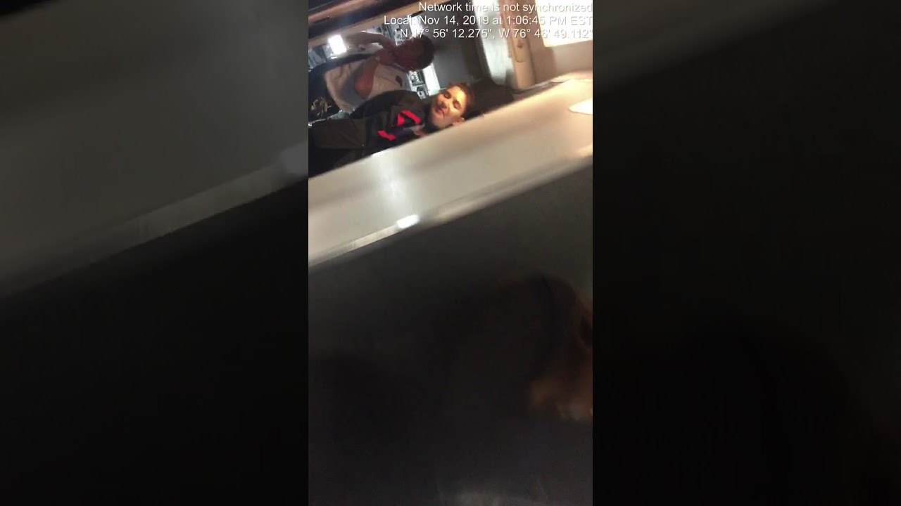 Rude American Airlines Flight Attendant Taunts man after Slamming his luggage