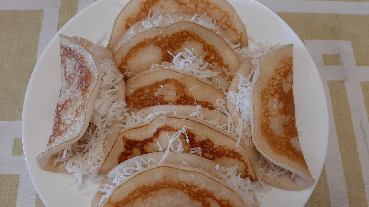 Delicious pancake with shredded coconut(នំអាកោចៀនជាមួយសាច់ដូង)