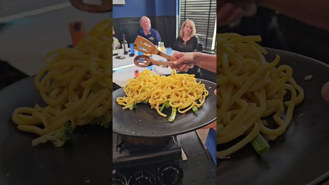 Chef Tom teaches a class on how to make Vegetable Lo Mein