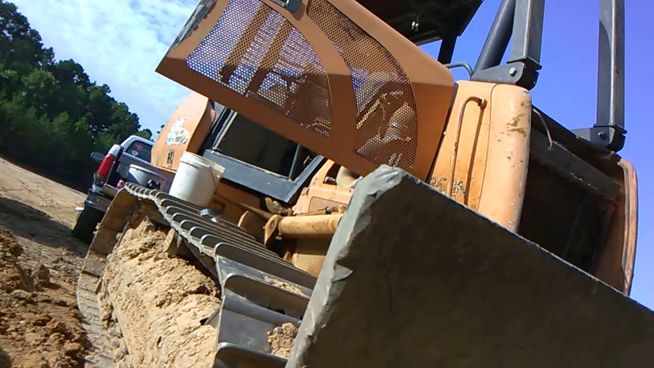 In God with How to change the Oil and Filter on 850K Case Dozer