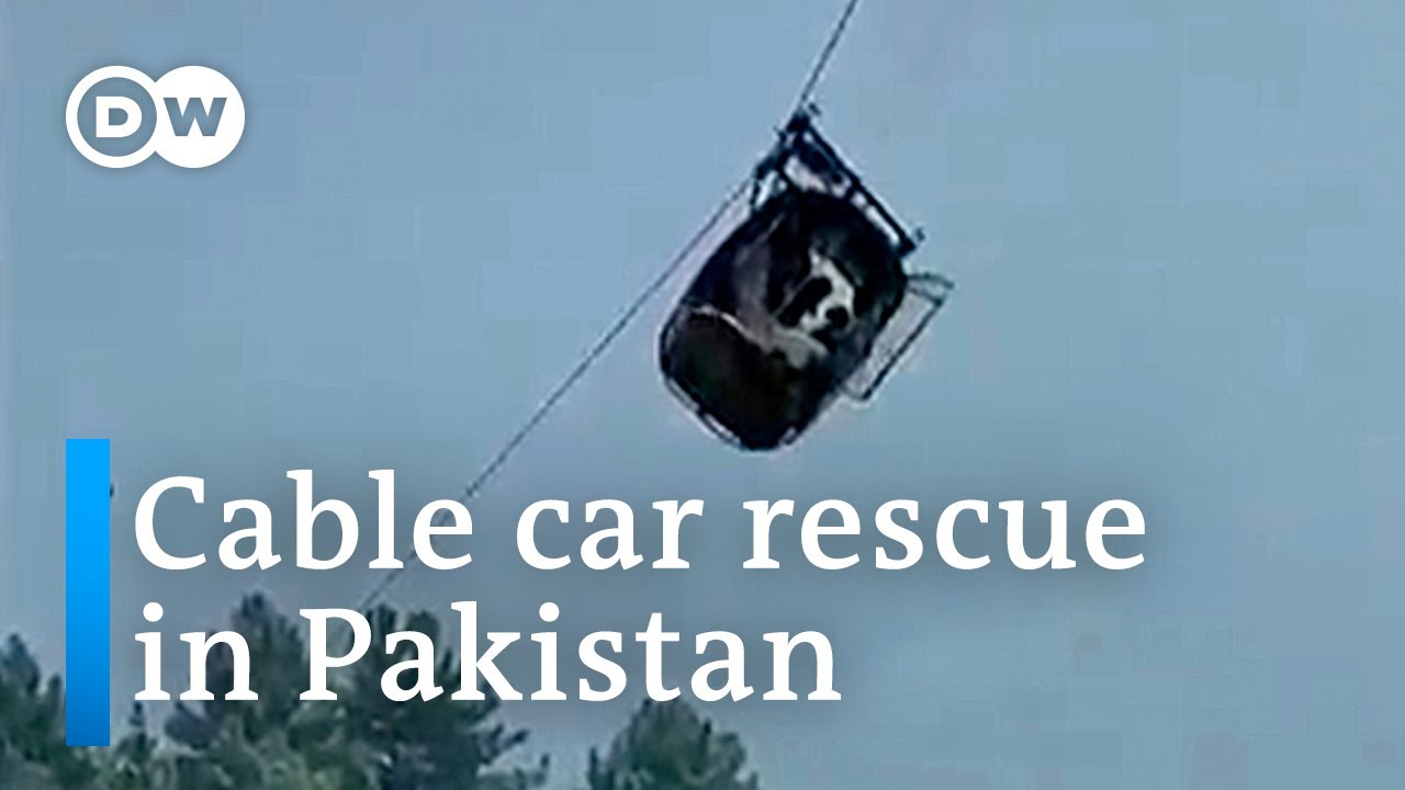 Pakistan: Locals rescue people trapped in a dangling cable car | DW News