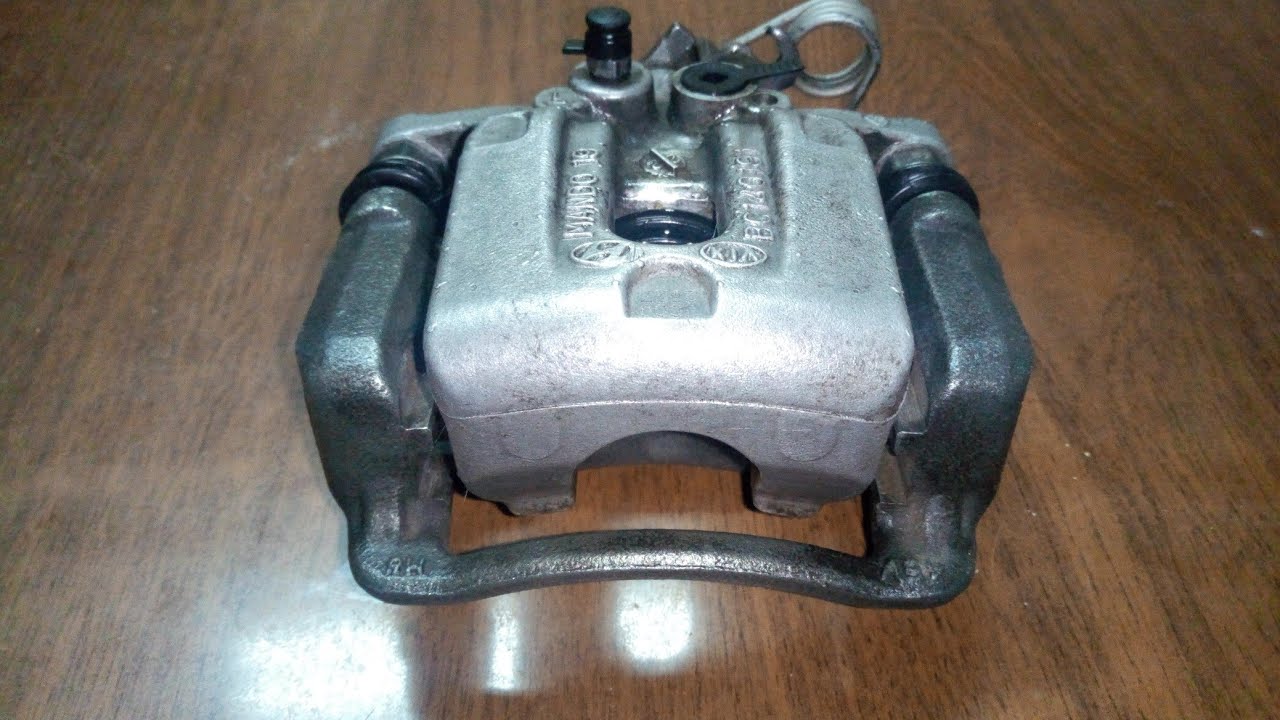 how to rebuild rear brake calipers  ابسط طريقه لاصلاح الفرامل الخلفيه للسياره