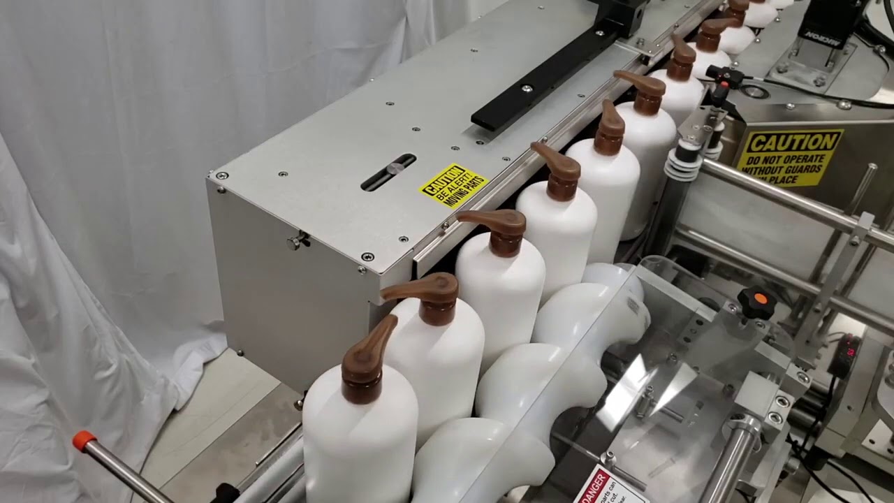 High Speed Servo Orienting Vertical Roller Labeling System - ProLine