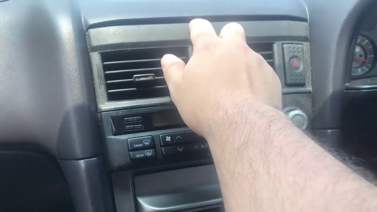 Removing an OEM head unit from a Nissan Skyline R34 25GT