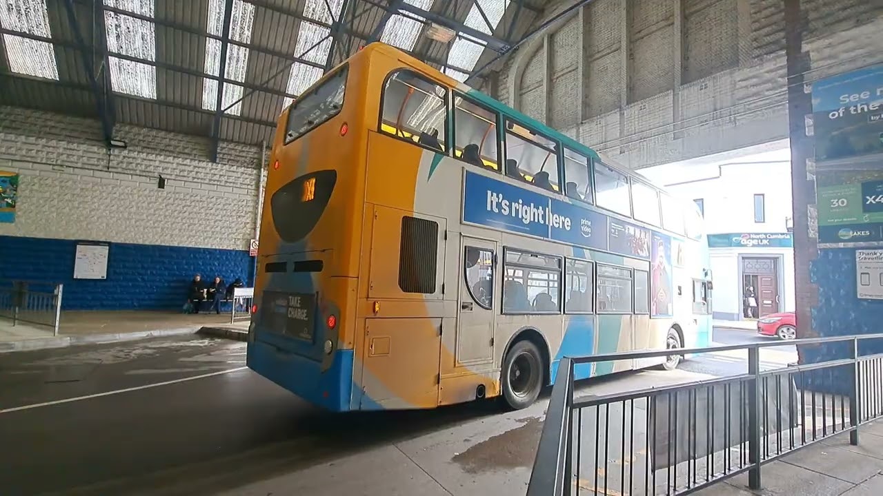 WORKINGTON WALKABOUT 02 3 26. GOOD VARIETY OF STAGECOACH ACTIVITY ON A CLOUDY AND GREY DAY.