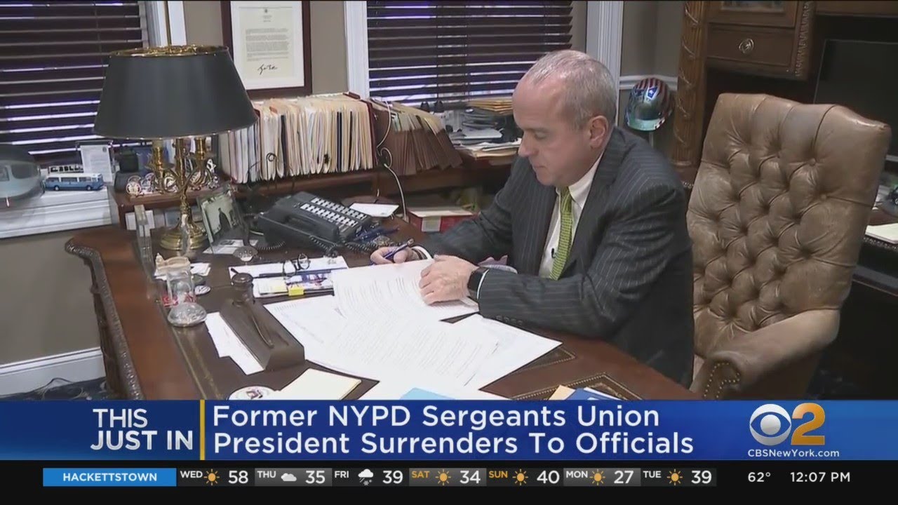 Former SBA president Mullins surrenders